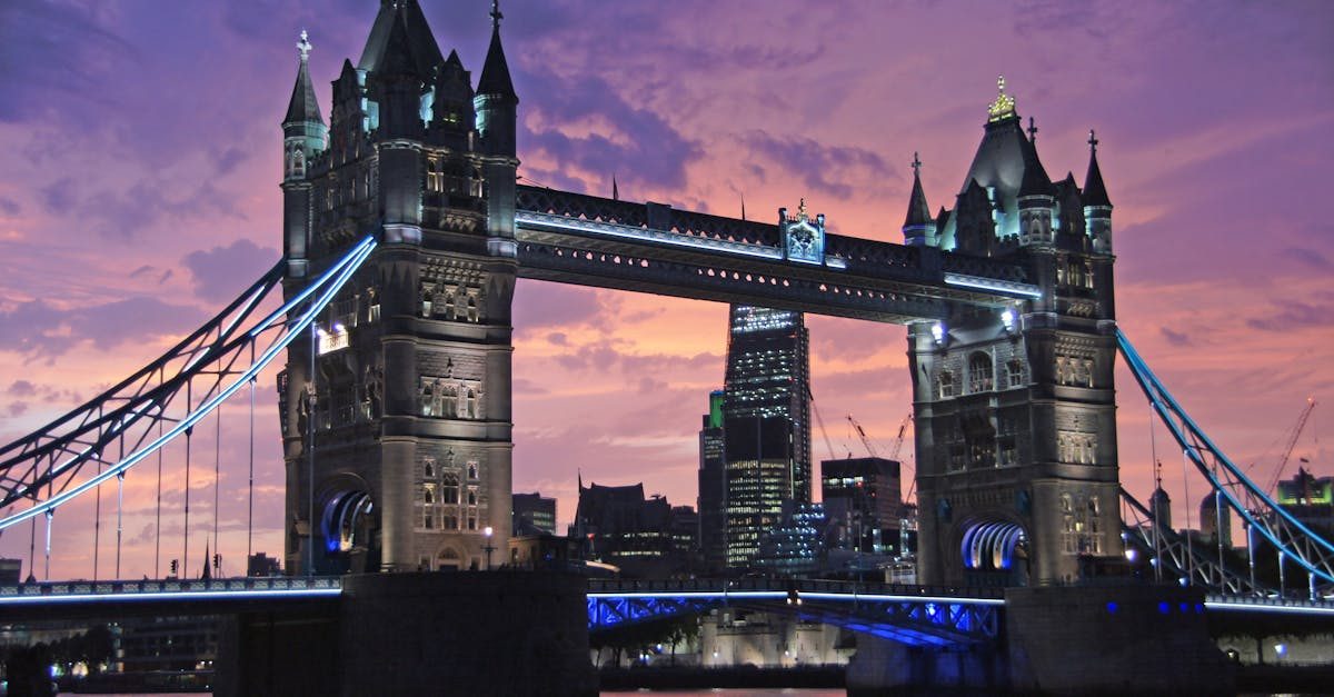 Iconic Tower Bridge in London against a stunning sunset sky. Perfect for travel and architecture themes.